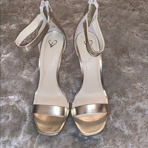 Gold strappy heel